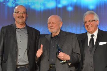 Recipient receiving an award on stage