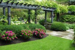 pergola with gardens and lawn