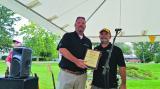 Dave Wright (left) accepts a plaque from LO President Paul Brydges.