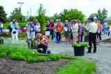 Open house visitors tour the many changes made to the Milton site earlier this year.