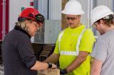 Harry Gelderman (left) works with Mohawk College Apprentices during a pre-build at the college.