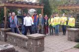 Volunteer take a quick break from the clean-up for a group photo.