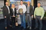 LO Show Committee member Nathan Helder (far left) and its chair Michael LaPorte (far right), present Upper Canada Stone staff Anna Buchanan, Justin MacDonald (centre) and Perry Hartwick with the award for outstanding promotion of the show.