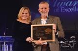 Bob Tubby proudly displays his LO Honourary Life Membership award with wife Mitzi.