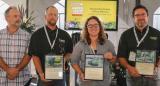 Opening morning of Thrive began with Awards of Excellence presentations. In photo, from left, LO second vice present Paul Brydges hands out award plaques for outstanding display of plant material, to Brian Sipkens of Sipkens Nurseries, Lesley Livingston of Canadale Nurseries, and Dorus Polman of Bradford Greenhouses Garden Gallery.