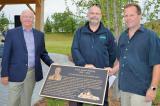 From left, Hanover businessman, Bill Roseborough, who approached Landscape Ontario members Paul Brydges of Brydges Landscape Architecture  and Tim Kraemer of Ground Effects Landscapes, to design, build the structure and landscape the area of the Country Meadow Estates Rest Area in Hanover.