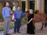 Denis Flanagan (centre), Adam Day and Myscha Burton (Stafford) pose with Nikkelodeon the pony and the Best Feature Garden award at the CNE in 2004.  