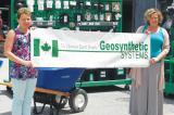 Grout and team stopped in for a delicious barbecue lunch at Geosynthetic Systems with Sue Windover, left, and Kelly Mulrooney-Côté.