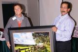 Judy Bell accepts the Community Partnership Award from John Klein, a board member with Community Living Quinte West.