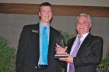 Jason Becker of Caterpillar, left, and Randy Tumber president of Tumber & Associates, winner of the Caterpillar Award of Excellence for Landscape Construction/Installation.