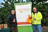 Chris Burns, president of the Ottawa Chapter and Clintar Landscape Management-Ottawa, on left, and Ed Hansen, vice president of the Ottawa Chapter and Hansen Lawn and Garden, take a break after volunteering at the Ottawa Cancer Survivors Park.