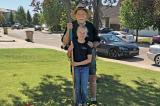 I am teaching 12-year-old Ashland how to maintain flower beds. Her parents own Cedar Creek greenhouse, where I work part time. She is an excellent worker. When she cleans the greenhouse, it is up to my standards.