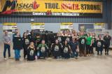 Landscape Ontario staff at Miska Trailer Factory in Hamilton, Ont., flanked by the company’s Paul Burns (far left) and Jessica Di Marino (far right).