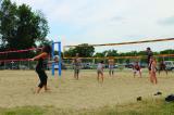 Family Day attendees work off their lunch during a pick-up game of volleyball at Bingemans.