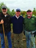 Mark Cullen, (centre) Board Chair of the Living Tribute, joined by cousin Bruce Cullen (left), recently retired as head groundskeeper of the Metro Toronto Zoo, and Norm Mills (right), President of Landscape Ontario’s Durham Chapter.