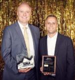 David Lammers (left) with the Excellence in Business Award, joined by his brother Paul Lammers, with the Safety Award.