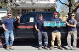 Pictured here (l-r) are the lucky prize winner and owner of Brickworks, Andrew Letersky, and his crew.