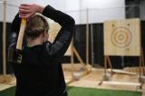 The axe throwing competition was one of four contests added to the GreenTrade Expo show floor this year.