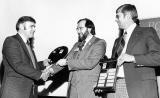 Waterloo Chapter president, Howard Gallup (left), accepts the first Membership Challenge Award back in 1979 from LO Executive Director, Dennis Souder, as chapter member, John Wright looks on.