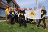 A Dig Safe flag was raised at the LO home office in Milton to promote April as Dig Safe Month.