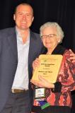 Monica van Maris, a pioneer member of Landscape Ontario and annual volunteer at Congress, was presented with a Leadership Award at the 50th IPM Symposium. She is shown accepting the award from Kyle Tobin, chair of the IPM Symposium Committee.