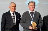 Terry Murphy presents Trillium Award to Jim Douglas at Congress 2014.