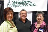 Adele Richards, left, and Jean Windover join Denis Flanagan at the Sarnia Home Show.