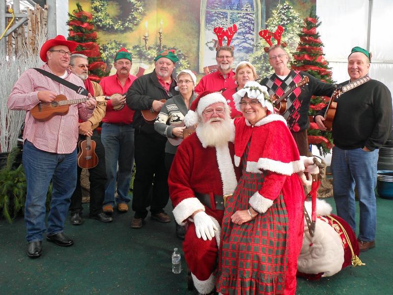 2014 - Merchandising Techniques - Outstanding Promotional Event - Santa & Mrs. Claus with ukulele band