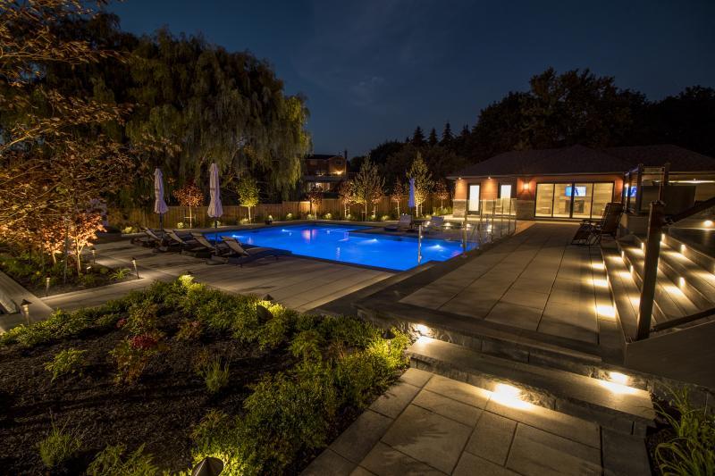 2017 - Landscape Lighting Design & Installation - Over $30,000 - Perspective of pool and cabana at night