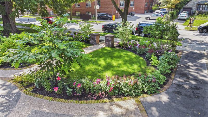2021 - Residential Construction - $50,000 - $100,000 - Gardens and lawn between walkway and driveway, including Astilbe, Peonies, an Eastern Redbud and Magnolia Tree