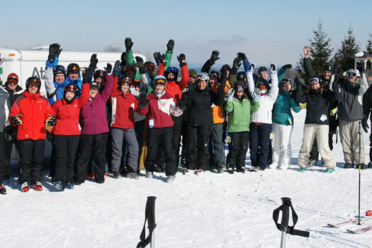 1589249966.GL_ski_day_group_2011-web