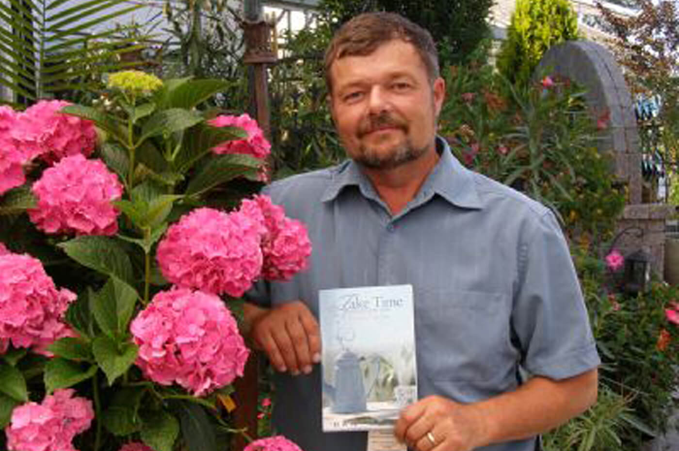 1589508480.Dan_Clost_and_book-web